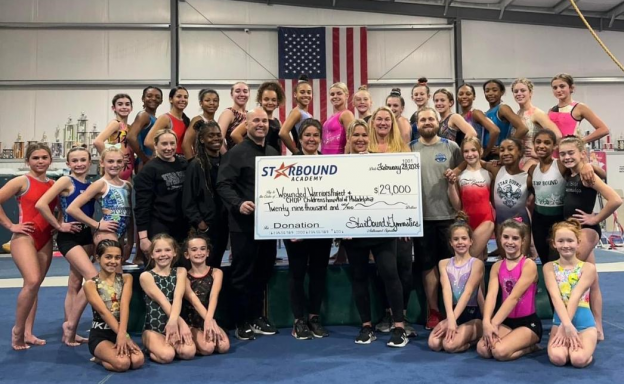 Donation_check_with_coaches_and_gymnasts